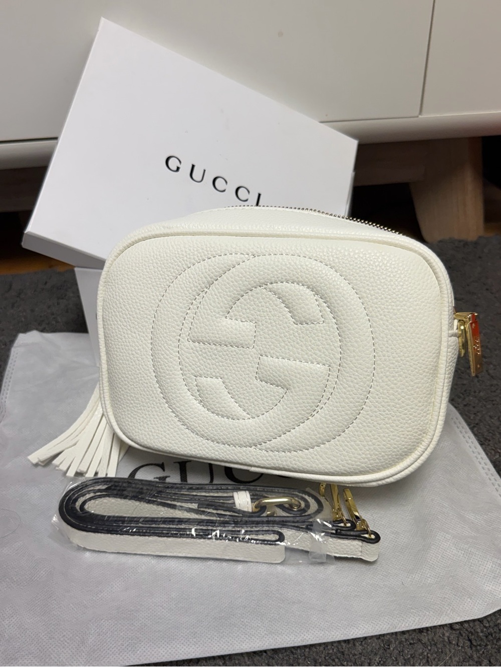 Bag G White Pebbled Leather Crossbody Camera Bag with Tassel